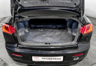 Подержанный автомобиль Mitsubishi Lancer Sedan 2009 года (18 фото)