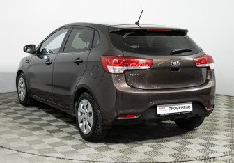Подержанный автомобиль Kia Rio Hatchback 2015 года (7 фото)