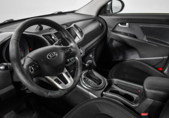 Подержанный автомобиль Kia Sportage 2013 года (9 фото)