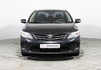 Подержанный автомобиль Toyota Corolla Sedan 2011 года (2 фото)