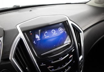 Подержанный автомобиль Cadillac SRX 2013 года (14 фото)