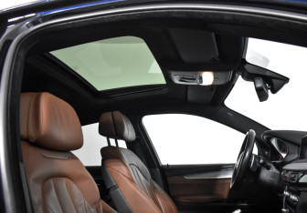 Подержанный автомобиль BMW X6 2016 года (15 фото)
