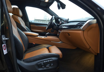 Подержанный автомобиль BMW X6 2016 года (26 фото)