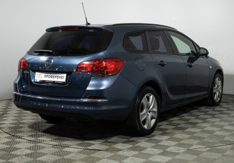 Подержанный автомобиль Opel Astra Wagon 2013 года (5 фото)