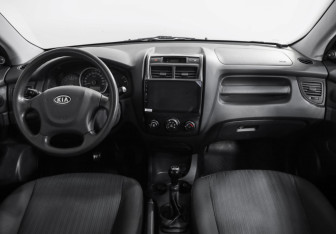 Подержанный автомобиль Kia Sportage 2009 года (10 фото)