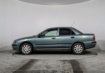 Подержанный автомобиль Mitsubishi Carisma Sedan 2003 года (8 фото)