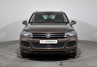 Подержанный автомобиль Volkswagen Touareg 2014 года (2 фото)