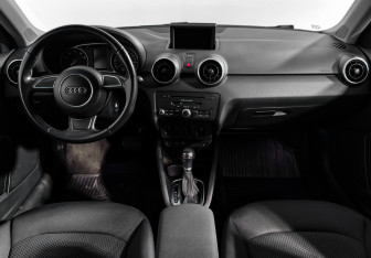Подержанный автомобиль Audi A1 2014 года (14 фото)