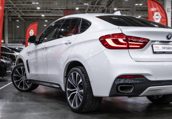 Подержанный автомобиль BMW X6 2016 года (16 фото)
