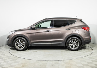 Подержанный автомобиль Hyundai Santa Fe 2014 года (8 фото)