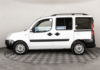 Подержанный автомобиль Fiat Doblo 2012 года (8 фото)