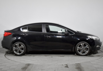 Подержанный автомобиль Kia Cerato Sedan 2014 года (4 фото)