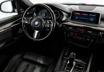 Подержанный автомобиль BMW X6 2015 года (18 фото)