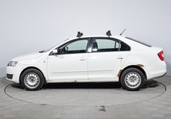 Подержанный автомобиль Skoda Rapid Liftback 2014 года (8 фото)