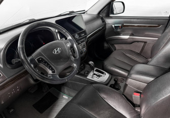 Подержанный автомобиль Hyundai Santa Fe 2012 года (9 фото)