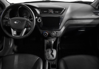 Подержанный автомобиль Kia Rio Sedan 2013 года (13 фото)