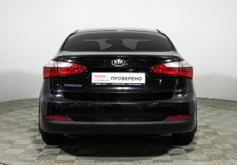 Подержанный автомобиль Kia Cerato Sedan 2013 года (6 фото)