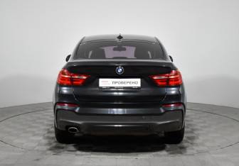 Подержанный автомобиль BMW X4 2015 года (6 фото)