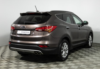 Подержанный автомобиль Hyundai Santa Fe 2014 года (5 фото)