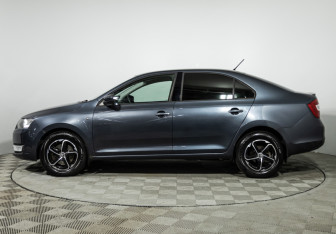 Подержанный автомобиль Skoda Rapid Liftback 2014 года (8 фото)