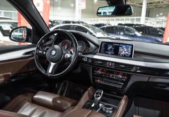 Подержанный автомобиль BMW X6 2017 года (14 фото)