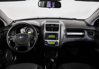 Подержанный автомобиль Kia Sportage 2010 года (10 фото)
