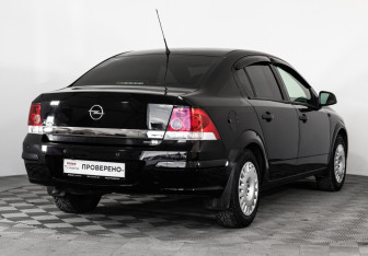 Подержанный автомобиль Opel Astra Sedan 2011 года (6 фото)