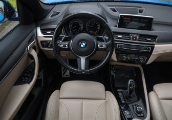 Подержанный автомобиль BMW X1 2021 года (13 фото)