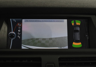 Подержанный автомобиль BMW X5 2012 года (15 фото)