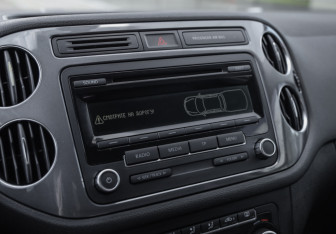 Подержанный автомобиль Volkswagen Tiguan 2013 года (15 фото)