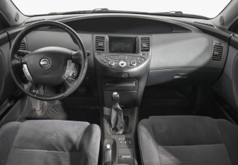 Подержанный автомобиль Nissan Primera Sedan 2006 года (13 фото)