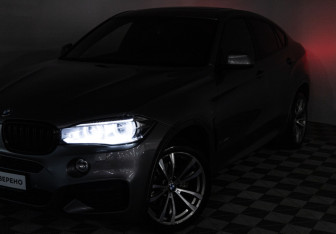 Подержанный автомобиль BMW X6 2017 года (33 фото)