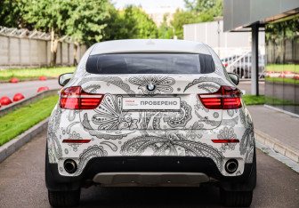 Подержанный автомобиль BMW X6 2013 года (7 фото)