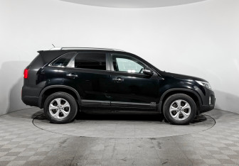 Подержанный автомобиль Kia Sorento 2014 года (4 фото)