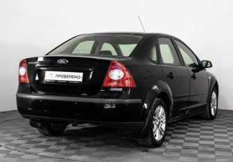 Подержанный автомобиль Ford Focus Sedan 2006 года (5 фото)