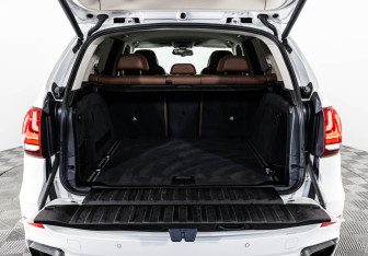 Подержанный автомобиль BMW X5 2015 года (33 фото)