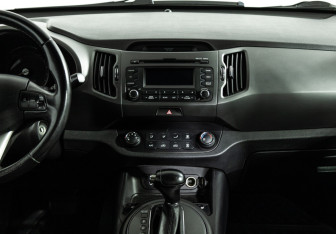 Подержанный автомобиль Kia Sportage 2013 года (14 фото)