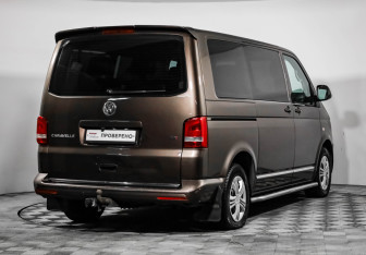 Подержанный автомобиль Volkswagen Caravelle 2013 года (5 фото)
