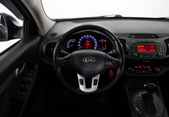 Подержанный автомобиль Kia Sportage 2013 года (10 фото)