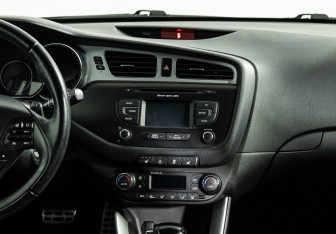 Подержанный автомобиль Kia Ceed Wagon 2014 года (14 фото)