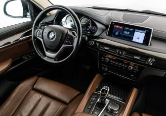 Подержанный автомобиль BMW X6 2017 года (16 фото)