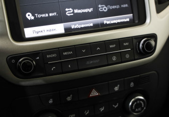 Подержанный автомобиль Kia Venga 2015 года (17 фото)