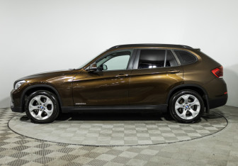 Подержанный автомобиль BMW X1 2014 года (8 фото)