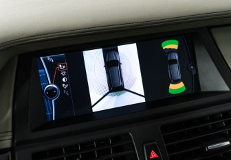 Подержанный автомобиль BMW X5 2010 года (17 фото)