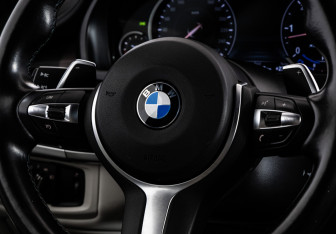 Подержанный автомобиль BMW X6 2018 года (13 фото)