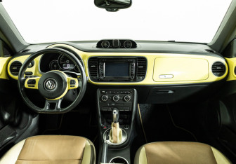 Подержанный автомобиль Volkswagen Beetle Hatchback 2014 года (13 фото)