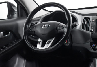 Подержанный автомобиль Kia Sportage 2015 года (14 фото)