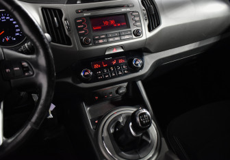 Подержанный автомобиль Kia Sportage 2014 года (15 фото)