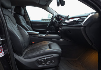 Подержанный автомобиль BMW X6 2018 года (26 фото)