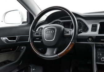 Подержанный автомобиль Audi A6 allroad 2010 года (15 фото)